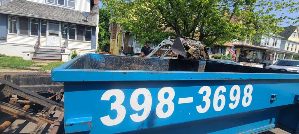 B. Wells Holdings LLC Dumpster Rental and Snow Plowing